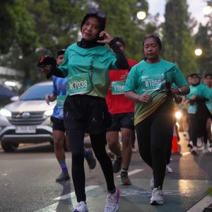 Race photo from BAUR RUN 2025