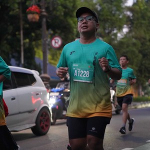 Race photo from BAUR RUN 2025
