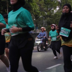 Race photo from BAUR RUN 2025