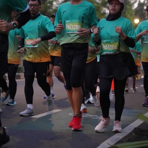 Race photo from BAUR RUN 2025