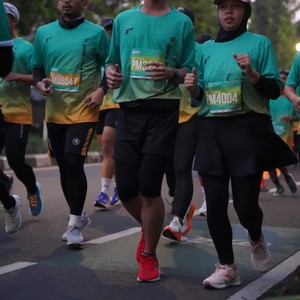 Race photo from BAUR RUN 2025