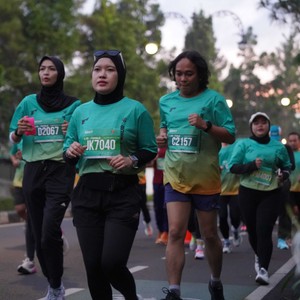 Race photo from BAUR RUN 2025