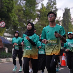 Race photo from BAUR RUN 2025