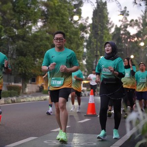 Race photo from BAUR RUN 2025
