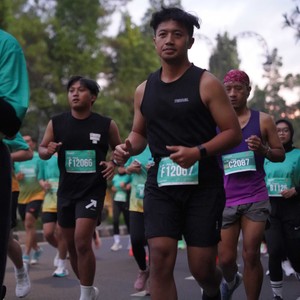 Race photo from BAUR RUN 2025