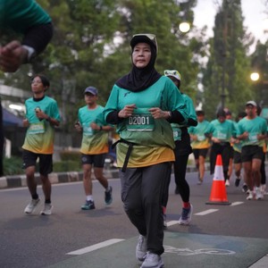 Race photo from BAUR RUN 2025