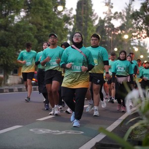 Race photo from BAUR RUN 2025