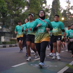 Race photo from BAUR RUN 2025