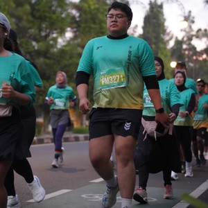 Race photo from BAUR RUN 2025
