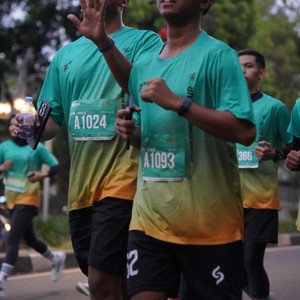 Race photo from BAUR RUN 2025