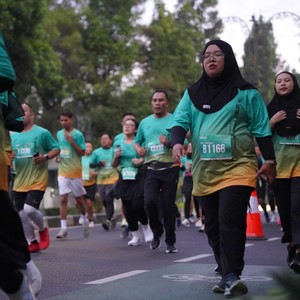 Race photo from BAUR RUN 2025