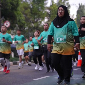 Race photo from BAUR RUN 2025
