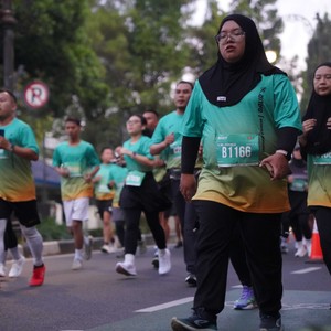 Race photo from BAUR RUN 2025