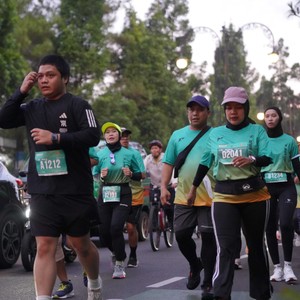 Race photo from BAUR RUN 2025