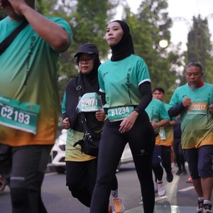 Race photo from BAUR RUN 2025