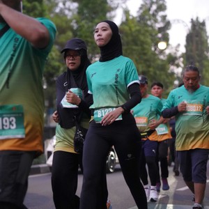 Race photo from BAUR RUN 2025