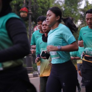 Race photo from BAUR RUN 2025