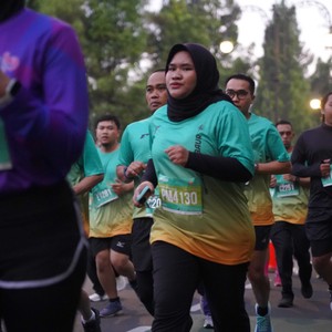 Race photo from BAUR RUN 2025