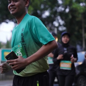 Race photo from BAUR RUN 2025