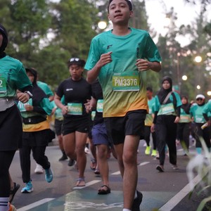 Race photo from BAUR RUN 2025