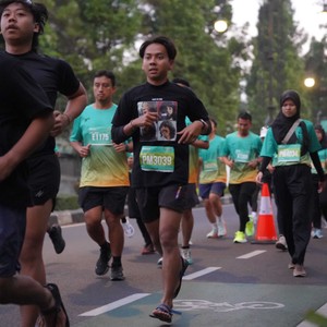 Race photo from BAUR RUN 2025