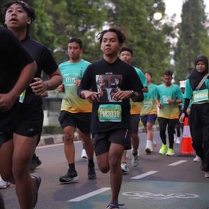 Race photo from BAUR RUN 2025