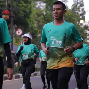 Race photo from BAUR RUN 2025
