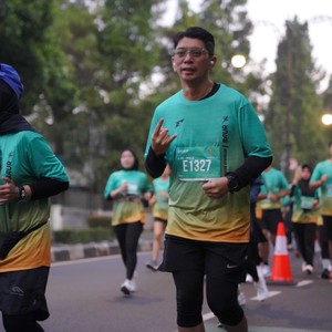 Race photo from BAUR RUN 2025