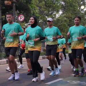 Race photo from BAUR RUN 2025