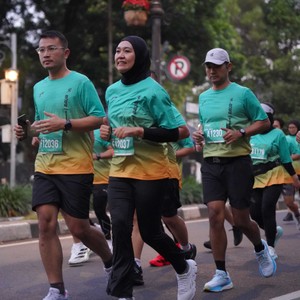 Race photo from BAUR RUN 2025