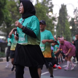 Race photo from BAUR RUN 2025