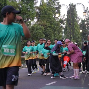Race photo from BAUR RUN 2025