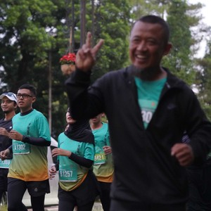 Race photo from BAUR RUN 2025