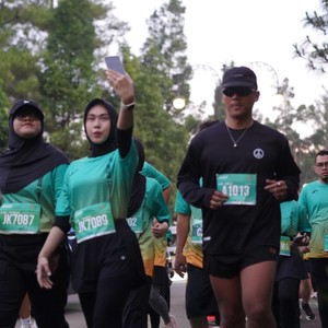 Race photo from BAUR RUN 2025