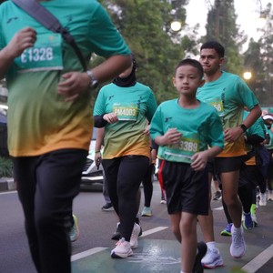 Race photo from BAUR RUN 2025