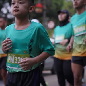 Race photo from BAUR RUN 2025