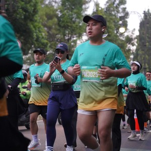 Race photo from BAUR RUN 2025