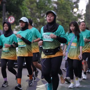 Race photo from BAUR RUN 2025