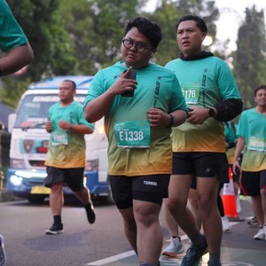 Race photo from BAUR RUN 2025