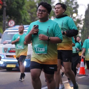 Race photo from BAUR RUN 2025