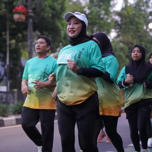 Race photo from BAUR RUN 2025