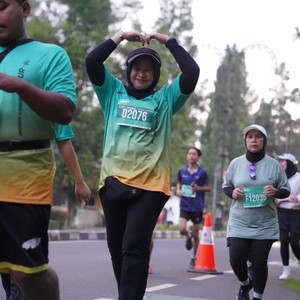 Race photo from BAUR RUN 2025